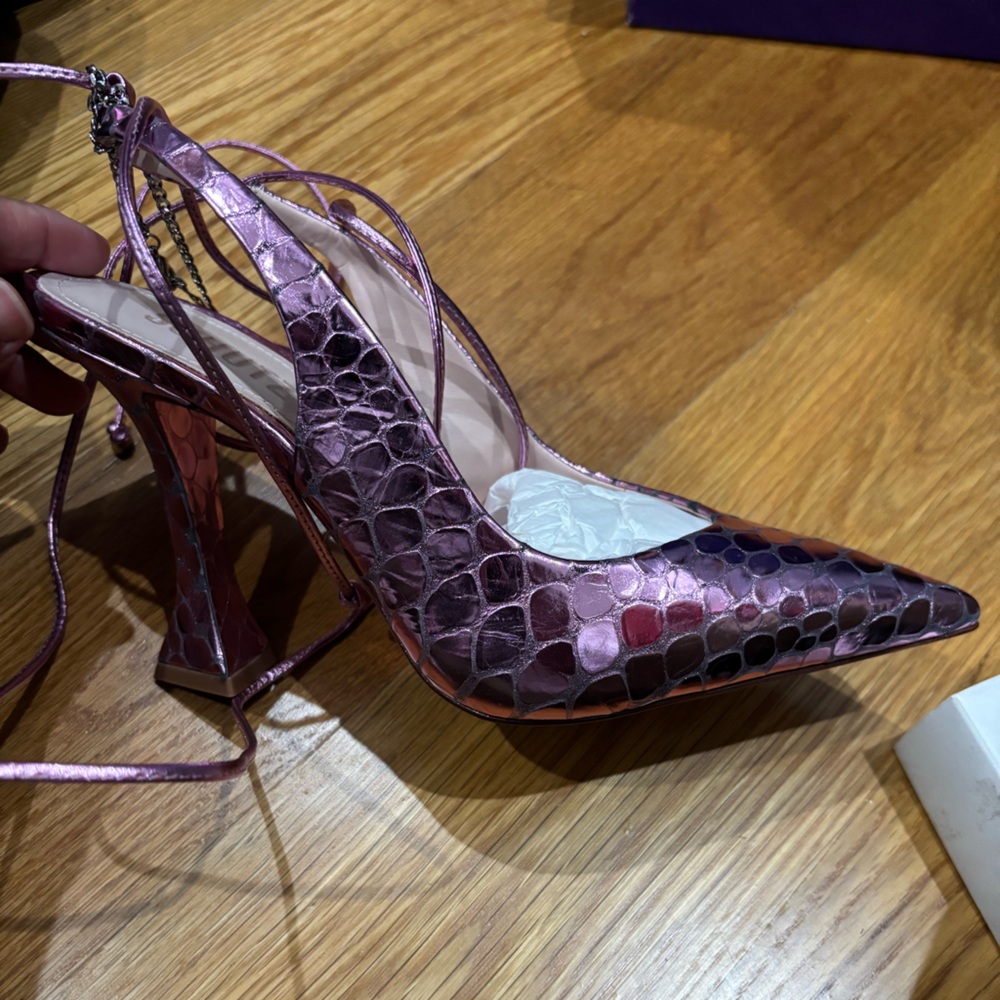 Never worn Schultz lilac heels Tie up the leg with and open heel.